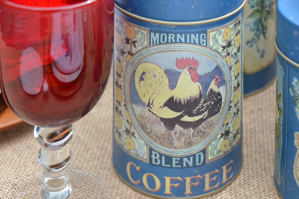 Two roosters on French Blue Coffee canister