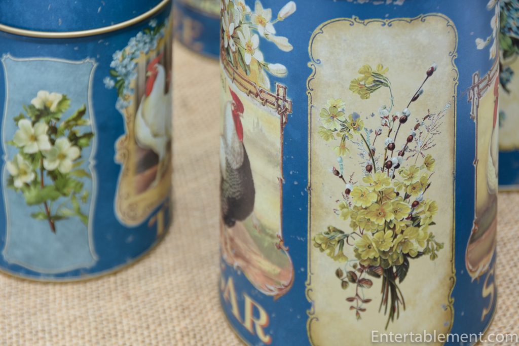 flowers on blue rooster canisters
